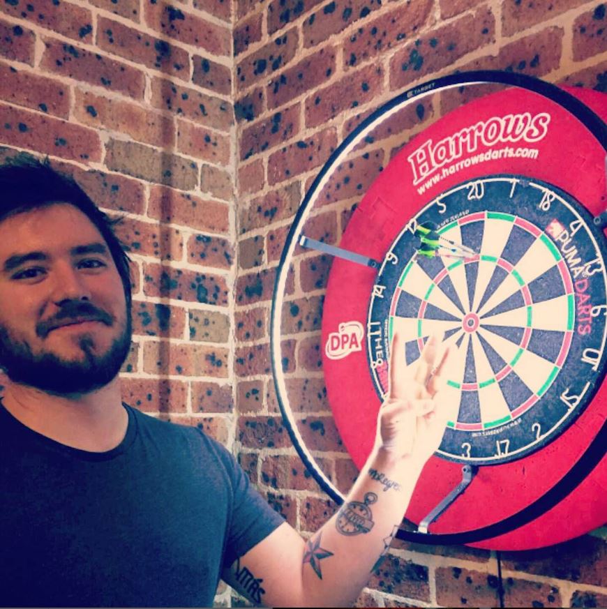 myself playing darts